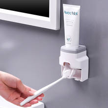 Dispositivo de exprimir pasta de dientes automática para el hogar, soporte doble para cepillo de dientes sin perforaciones, montado en la pared, para Baño 2024 - compra barato