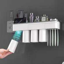 Soporte para cepillos de dientes, dispensador automático de pasta de dientes con taza, estante de almacenamiento de artículos de tocador de montaje en pared, Set de accesorios de baño 2024 - compra barato