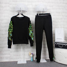 Calças elegantes conjunto para senhoras de duas peças mulheres fatos de treino peacoke pena bordado outono moda manga longa runway sweatsuits 2024 - compre barato
