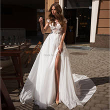 Boho Wedding Dresses with High Slit Lace Applique Sheer Neckline Short Sleeve Bridal Gowns 2020 Backless Court Train Bride Dress 2024 - buy cheap