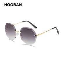 Очки солнцезащитные HOOBAN женские круглые, модные брендовые дизайнерские Классические солнечные очки без оправы, для вождения, UV400 2024 - купить недорого