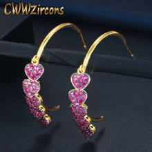 Cwwzircon полукруглые розово-красные фианиты хрустальные свисающие подвески в форме сердца Золотые серьги-кольца для женщин CZ752 2024 - купить недорого