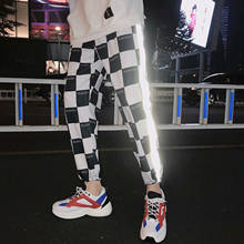 Pantalones reflectantes de empalme para hombre, ropa de calle a la moda, color blanco y negro, estilo Hip Hop, con cintura elástica 2024 - compra barato
