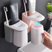 Juego de accesorios de baño con ventosa magnética automática, soporte para cepillo de dientes, taza de cepillado, estante de montaje en pared, envío directo 2024 - compra barato