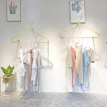 Роскошная стильная витрина для магазина женской одежды Детская полка для одежды 2024 - купить недорого