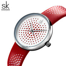 Часы Shengke женские кварцевые, дизайнерские креативные, с кожаным ремешком, с полым циферблатом, красные 2024 - купить недорого