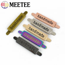Meetee-Etiquetas de bolso de Metal hechas a mano, hebillas decorativas para monedero, accesorios de costura, 10x35mm, 10/20 Uds. 2024 - compra barato