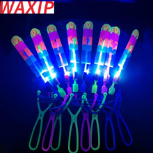 100Pcs/lot or 50pcs Amazing Light Arrow Rocket Helicopter Flying Toy LED Light Flash Toys Party Fun Gift Rubber Band Catapult 2024 - купить недорого